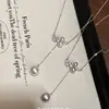 Colar Manta Pérola Rosa Estilo Francês para Mulheres 2026 Novo Modelo Luxo Leve Retrô Nicho Corrente da Clavícula Tendência Atacado