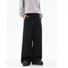 Pantalones negros de pierna ancha para hombre y mujer, nuevo estilo primavera/otoño 2026, diseño plisado de nicho, tacto de alta gama, pantalones rectos holgados y fluidos hasta el suelo