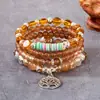 Bestseller transfronterizo: Pulsera colgante estilo bohemio de árbol de la vida calado, pulsera de cuentas con cordón elástico multicapa
