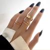 Traje de anillo retro transfronterizo europeo y americano creativo amor hueco mariposa plata antigua anillo de articulación traje multi-combinación