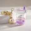 Llavero colgante de botella de arena movediza de red roja creativa, muñeco de perro Yugui flotante, adornos para bolso, accesorios acrílicos
