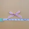 En stock espiga moño pequeño 6mm tocado empaque de caja de regalo decoración de ropa zapatos y sombreros accesorios hechos a mano DIY al por mayor