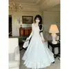 Suéter de Tricô Escovado Versátil Estilo Suave para Mulheres 2026 Outono e Inverno Nova Moda Saia Plissada com Pom-Pom Espessa Linha A