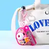 Mochila con Cámara de Proyección Auténtica de Las Chicas Superpoderosas Colgante Llavero Juguete Infantil Decoración Regalo de Graduación Venta al por Mayor