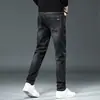 Jeans de Sarja Masculino para Atacado Primavera e Outono Marca da Moda Calças Casuais Retas Largas Moda Calças Masculinas Lavadas em Água Elásticas Versáteis Calças Compridas