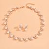 Joyería al por mayor transfronteriza Europa y Estados Unidos explosiones damas perla de imitación en forma de S joyería nuevos accesorios de boda nupcial 985#
