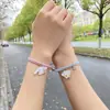 Vento Vermelho da Internet elástico pequeno corda de mão pulseira de casal um par de cordas de cabelo atraentes para meninas corda de cabelo Vento Vermelho da Internet amor magnético