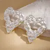 Brincos Assimétricos Plissados de Coração com Agulha de Aço Estilosos Europeus e Americanos Transfronteiriços Nicho Moda de Alto Padrão Elegantes Simples