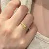 Libro rojo pequeño explosiones anillo de serpiente de oro liso mujeres 2024 nuevo anillo abierto cepillado antiguo una generación de pelo