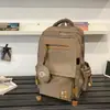 Mochila 2025 Nova de Grande Capacidade Fashionável Mochila Escolar para Aluno do Ensino Fundamental Mochila Redutora de Carga para Estudante Universitária Bolsa de Viagem