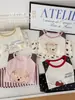 Colección Otoño 2026 Pijamas Infantiles Algodón Puro Clase A Conjunto de Ropa Interior para Bebé Ropa de Casa para Niñas Ropa y Pantalones de Otoño para Niños