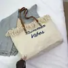 2025 Nova Bolsa de Lona com Franjas e Letras Coreanas Feminina de Grande Capacidade Moda Casual para Ir ao Trabalho Bolsa Tote de Ombro para Estudante
