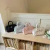 Bolsa Cruzada de un Hombro de Venta Caliente Bolso de Mano 2026 Nuevo Diseño de Verano con Bolsillo para Pantalones Bolso de Mujer de Alta Gama Moderno Elegante