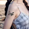 Tatuaje Temporal Impermeable a Prueba de Sudor de Larga Duración Bow Herbal de Alta Gama Textura Femenina Artificial de Buen Aspecto Tatuaje Masculino Pegatinas de Tatuaje