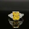 Anillo de Diamante de Alto Carbono S925 Europeo y Americano Explosiones en Vivo Femeninas Cara de Corte Flor de Hielo Seiko Anillo de Diamante Incrustado Completamente Uso Diario