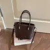 Bolsa de ombro altamente estilosa e espaçosa, portátil e versátil para sair, bolsa de axila feminina 2026, bolsa tote simples e elegante para o dia a dia