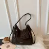 2026 Mochila Nueva de Gran Capacidad Pequeña Múltiples Bolsillos Traseros Diseño Hermoso Elegante Versátil Casual Bolso de Hombro