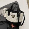 La popular bolsa de mano de moda de este año, estilo pequeño y fragante, con rombos de color contrastante, para mujer, versátil para el trabajo, bandolera de alta gama