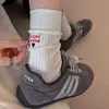 Nuevos calcetines de mujer estilo coreano con bloques de color, rayas verticales y bordado de corazón, calcetines de media pantorrilla para otoño e invierno, calcetines de algodón para mujer de doble aguja, calcetines largos apilables
