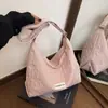 Bolso tote moderno de gran capacidad para mujer, nueva colección 2026, elegante diseño a rayas, estilo japonés, bolso de hombro simple y dulce