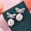 Brincos de Luxo com Laço Cravejado de Diamantes e Pérolas, Novo Estilo, Design de Nicho, Simples, Exquisitos, Modernos, Versáteis e de Alta Qualidade