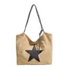 Tendência transfronteiriça bolsa tote de mão nova feminina bolsa 2026 outono nova estrela bolsa de ombro única estilosa bolsa de axila da moda