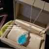 Colar de gema gota d'água azul Maldivas banhado a ouro 18K Wangwang combinação de brincos de zircônia com superfície de ovo