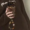 Pulsera de gato con estampado de leopardo, adecuada para funda de teléfono Apple 17pm, funda de silicona para iPhone 18, 16, Maillard, 14, ventana grande, 15