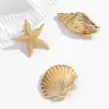 Pinza para el Cabello de Estrella de Mar Dorada y Caracola, Pinza de Cocodrilo Metálica Casual Estilo Vacacional Transfronterizo Europeo y Americano, Accesorio para el Cabello con Elementos Marinos de Playa