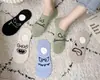 Calcetines invisibles para mujer Zhuji, calcetines de media pantorrilla estilo japonés para primavera y otoño, calcetines holgados de color liso transpirables que absorben el sudor, calcetines para hombre de fábrica al por mayor