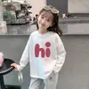 Capa base de longitud media para primavera y otoño 2026 Nuevo estilo para niños Camiseta de algodón puro Muy bonita Moderna Camiseta de manga larga para niñas