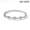 Pulsera de Acero Titanio Chapado en Oro de 18 Quilates Estilo Europeo y Americano Transfronterizo, Diseño de Nicho Corazón Hueco con Circonitas, Brazalete de Moda y Versátil
