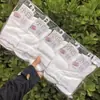 Meias Casuais Femininas Longyixiang de Cano Médio Brancas Fofas Versáteis de Algodão Branco Estilo College 26 Novo Modelo Outono/Inverno