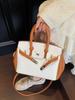 Bolso Kelly de Mano Retro de Lujo Ligero Transfronterizo para Mujer 2025 Nuevo Bloque de Color Moda Trendy Commuter Hombro Bandolera