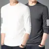 Camiseta elástica de manga larga para hombre, corte holgado, adecuada para primavera y otoño, color liso, versátil, se puede usar como atuendo de pareja, capa interior para hombre