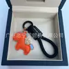 Dinero en el Caballo Cuero de Vaca Creativo Exquisito Casual Regalo de Pareja Bolso Lindo Colgante Llavero de Coche Llavero