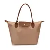 Bolso versátil de moda transfronterizo para mujer, nuevo tejido de nailon, ligero, tacto de alta gama, bolso tote, bandolera cruzada de moda, bolso para ir al trabajo