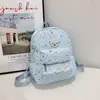 Cabeza de Conejo Linda Moda Nueva Otoño Temprano Fresco Gran Capacidad Diseño de Nicho Estampado de Estrellas Texturizado Mochila