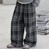 Conjunto de Moletom com Capuz Falso de Duas Peças e Calça Wide Leg Xadrez para Meninas Primavera e Outono 2026 Novo Estilo Conjunto Casual Coreano de Duas Peças para Crianças Pequenas e Grandes