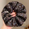 Elástico para coleta baja con lazo elegante, accesorio para el cabello para atar y peinar el cabello, diadema con estampado de leopardo, nuevo estilo 2026, cuerda para el cabello de estilo casual