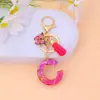 Pegamento de Cristal Resina Lentejuelas Llavero con Letra Niña Mariposa Borla Colgante de Bolsa Venta Caliente Transfronteriza Regalo