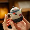 Colección de Teteras de Cerámica Pintadas a Mano Estilo Antiguo con Esmalte Caramelo, Diseños Azul Índigo y Melocotón Rojo para Uso Doméstico, Incluyendo Tetera, Gaiwan, Taza de Maestro y Taza de Té