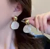 Pendientes de botón de perla de plata de ley 925, Versátiles y elegantes, Pendientes nuevos de moda para mujer, Pendientes de botón al por mayor que son suaves para los lóbulos de las orejas