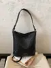Bolsas Femininas 2026 Estilo Coreano Nova Moda Retrô Tecido para o Dia a Dia Elegante Simples Bolsa de Ombro Único Bolsa de Balde Bolsa Tote