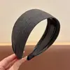 Faixa de cabeça larga de tricô minimalista e elegante estilo coreano para mulheres, novo modelo 2026, adequada para uso diário, projetada para realçar a aparência da linha do cabelo e pode ser usada como faixa de cabeça para lavar o rosto ou presilha de cabelo