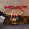 Festival del Bote del Dragón zongzi pulsera tejida a mano estilo nacional cuerda roja cuerda colorida aleación conejo pulsera de mano pequeños regalos al por mayor
