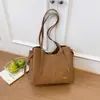 Bolso tote diario de color liso transfronterizo, bolso de gran capacidad de moda para mujer, nuevo estilo Otoño 2026, bolso de hombro único a la moda para ir al trabajo