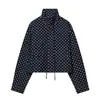 Moda Europea y Americana Transfronteriza Artículos Más Vendidos de Aliexpress: Chaqueta de lunares con cuello alto y mangas abullonadas + Pantalones cortos de tiro bajo con mini bolsillo