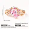 Anillo de Luz con Forma de Pera Rosa de Circonita Cúbica de Venta Caliente Transfronteriza Anillo de Corona Hueca de Lujo con Piedra de Color
