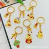 Llavero Colgante Año Nuevo 2026 Metal Zodiaco León Dorado Petardo Despertar Bolsa de la Fortuna Colgante Evento Pequeño Regalo
